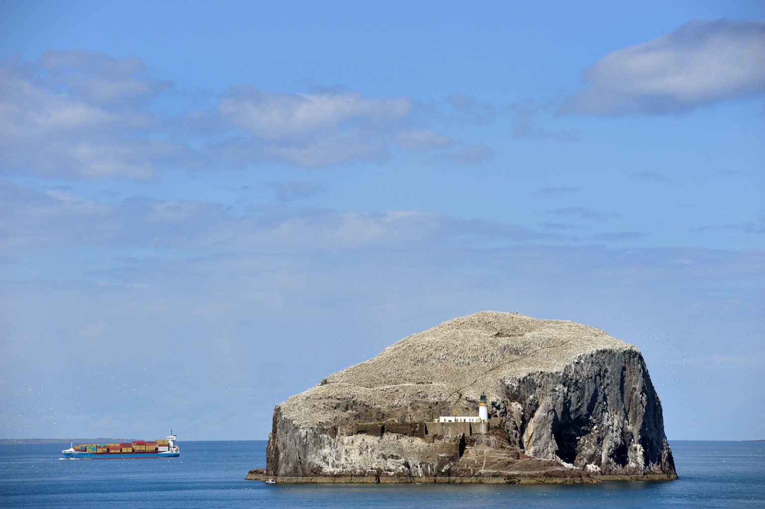 Bass Rock - a bird colony, a site for a lighthouse and, in the past, a prison.